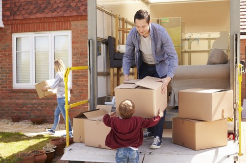 Removal truck and moving crew for a Mile End house relocation