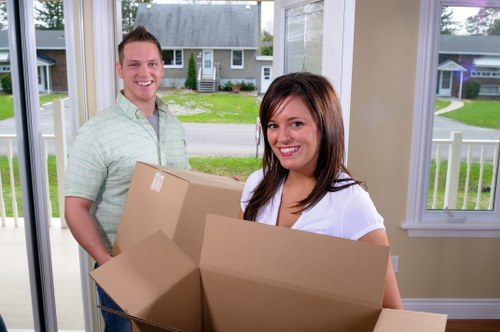 Residential flat move support in Mile End with boxes and furniture