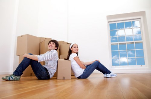 Removal van and movers completing a local move in Mile End