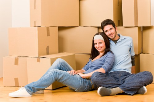 Packers organising household items for a Mile End relocation