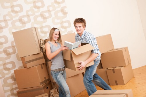 Local removals crew handling access and loading in East London