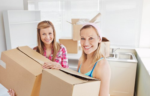Preparing desks and boxes for an office move in Mile End