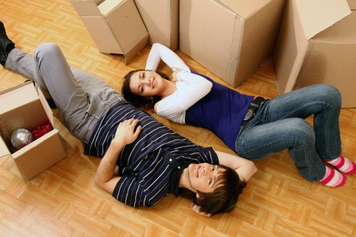 Careful handling of household items during a Mile End flat move
