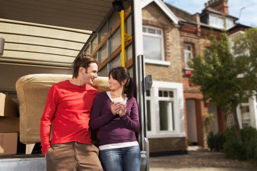 Van moving furniture from a flat in a busy Mile End area